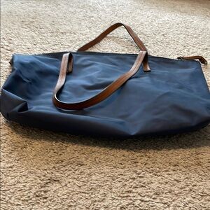 Stylish Navy Blue Tote Bag with Brown Straps by banana republic